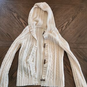 Cream colored cable knit sweater
